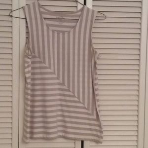 Tan and white stripe sleeveless top.
